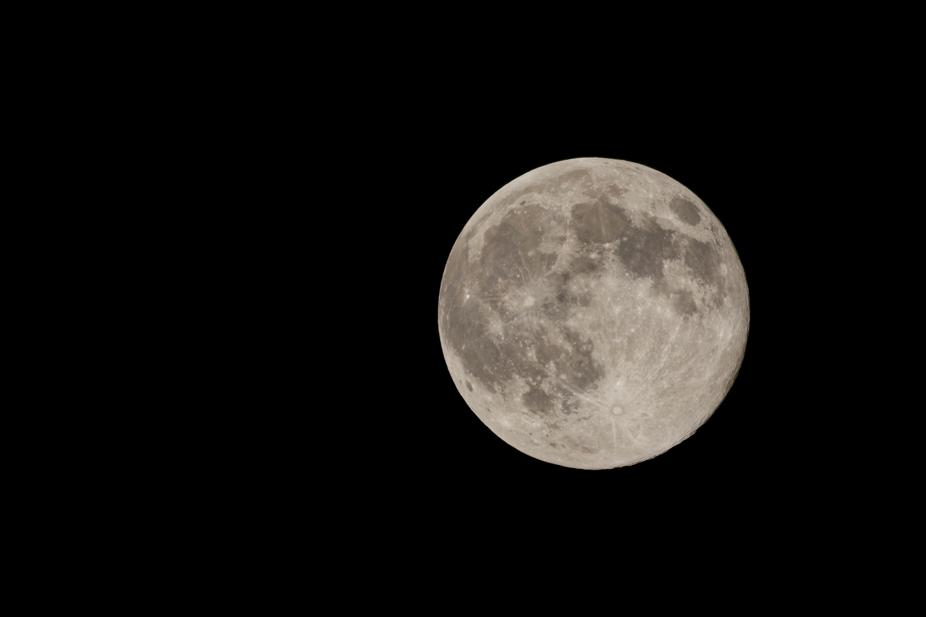 Full moon against a dark sky.